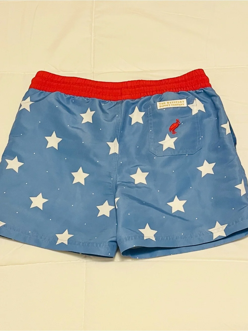The Beaufort Bonnet Company Blue Star Swim Trunks with Red Waistband